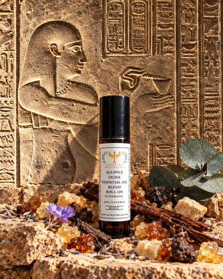 Botanical perfume in front of hieroglyphic