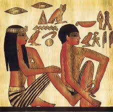 Egyptian hieroglyphic of a man giving a foot massage to a woman