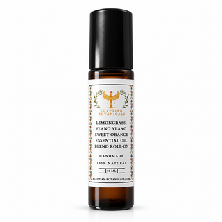 A 10 ml amber glass roll-on bottle with a black cap and a white label from Egyptian Botanicals, containing a lemongrass, tlang ylang, and sweet orange essential oil blend.