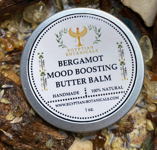 Bergamot mood boosting butter balm container with Egyptian Botanicals branding on a natural product background.