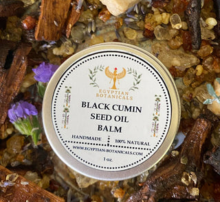 Black cumin seed oil balm with a label on a natural background