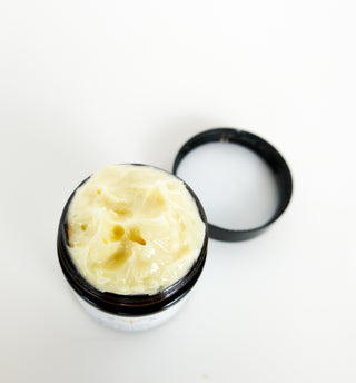 Egyptian Musk Body Butter Balm in a glass container