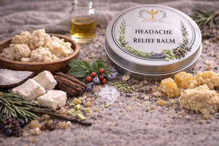 Headache relief balm with natural ingredients on a textured surface