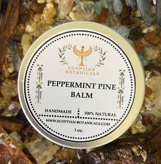 Peppermint Pine Balm container with Egyptian Botanicals branding on a natural stone background.