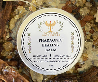 Pharaonic Healing Balm container with Egyptian Botanicals branding on a natural stone background.