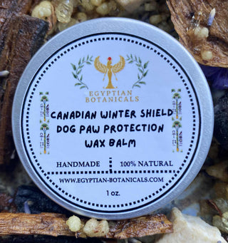 Dog paw protection wax balm container with 'Egyptian Botanicals' branding on a natural background.