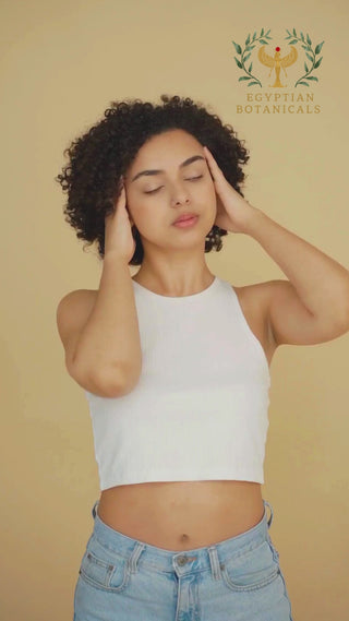 girl touching her temples